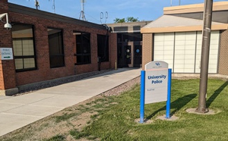 Sidewalk leading from the accessible parking to the entrance of Bissell Hall. 