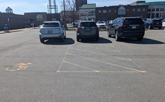 Accessible parking on the west side of the University Bookstore in the Bookstore parking lot. 