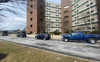 Accessible parking on the south side of Cooke Hall on Mary Talbert Way. 