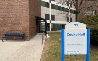 Sidewalk leading from the accessible parking to the entrance of Cooke Hall. 