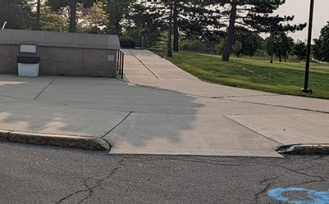Sidewalk leading from the accessible parking to the entrance of Crofts Hall. 
