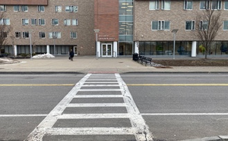 Crosswalk leading from the accessible parking to the barrier-free entrance in Greiner Hall. 