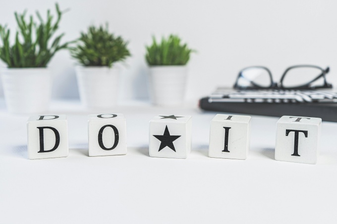 Alphabet blocks spelling out Do It. 