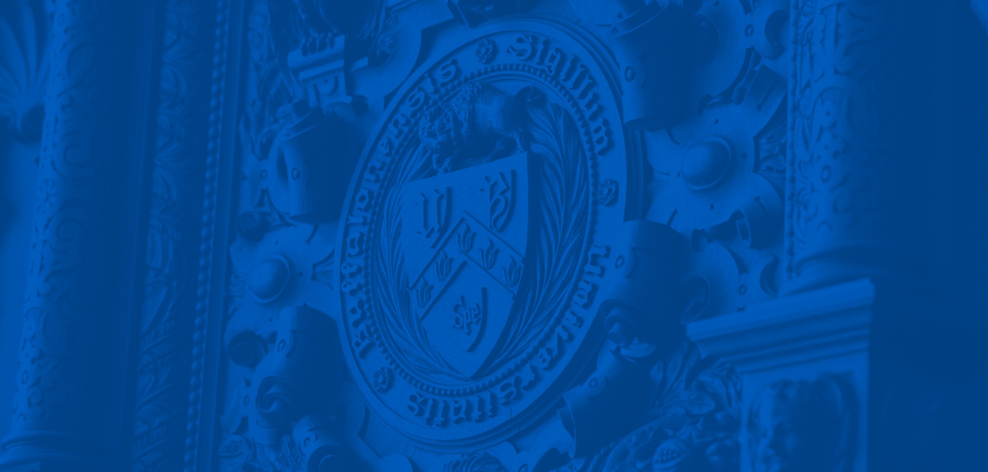 Close up of a stone carved UB Crest.