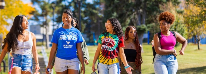 Group of students walking in front of Hayes Hall. 