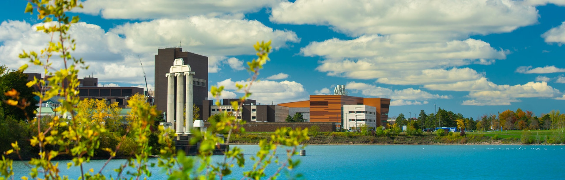 View of Lake LaSalle with Baird Point and other north campus building in background. 