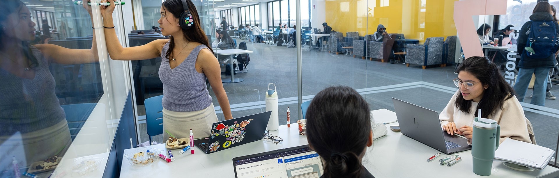 Students working together in a UB library.