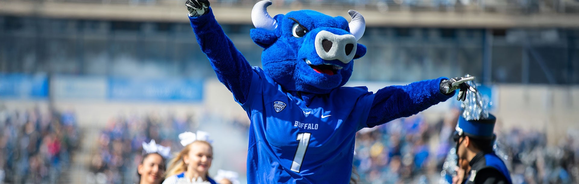 Victor E. Bull cheering at a UB football game. 