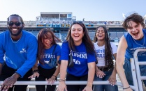 UB students at Broadview Stadium getting excited for a UB Football game. 