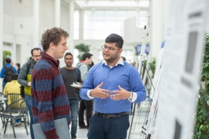 Student presenting a poster. 