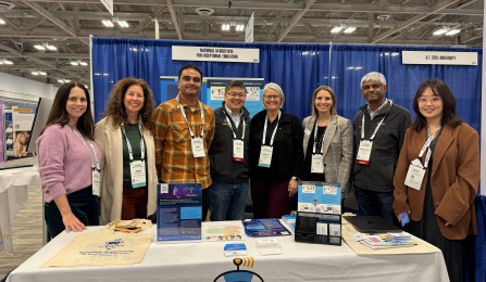 Faculty pose at the National AI Institute for Exceptional Education table. 