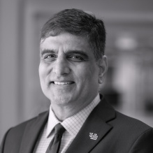 A portrait of Venu Govindaraju after he spoke at a meeting of the Buffalo Niagara Partnership in Buffalo, NY in January 2024. The presentation was titled Convergence of Artificial Intelligence to solve societal problems. Photographer: Douglas Levere. 