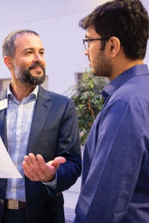 An alumni providing feedback on a student's resume. 