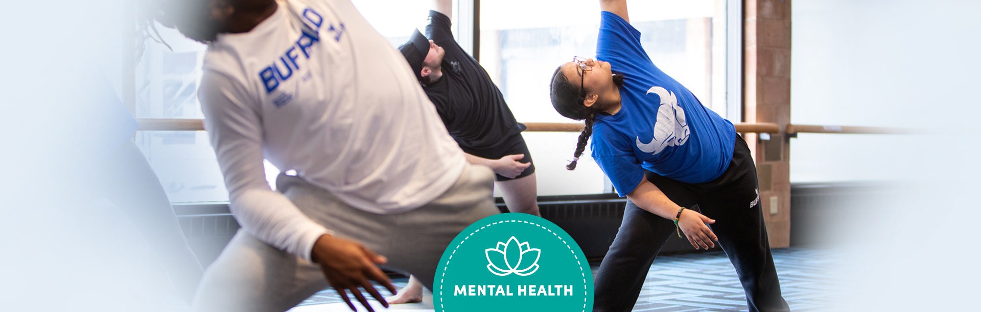 UB students doing yoga. 