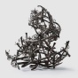 Sculpture by Claire Falkenstein of combined copper creating abstract form. 