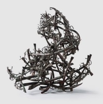 Sculpture by Claire Falkenstein of combined copper creating abstract form. 