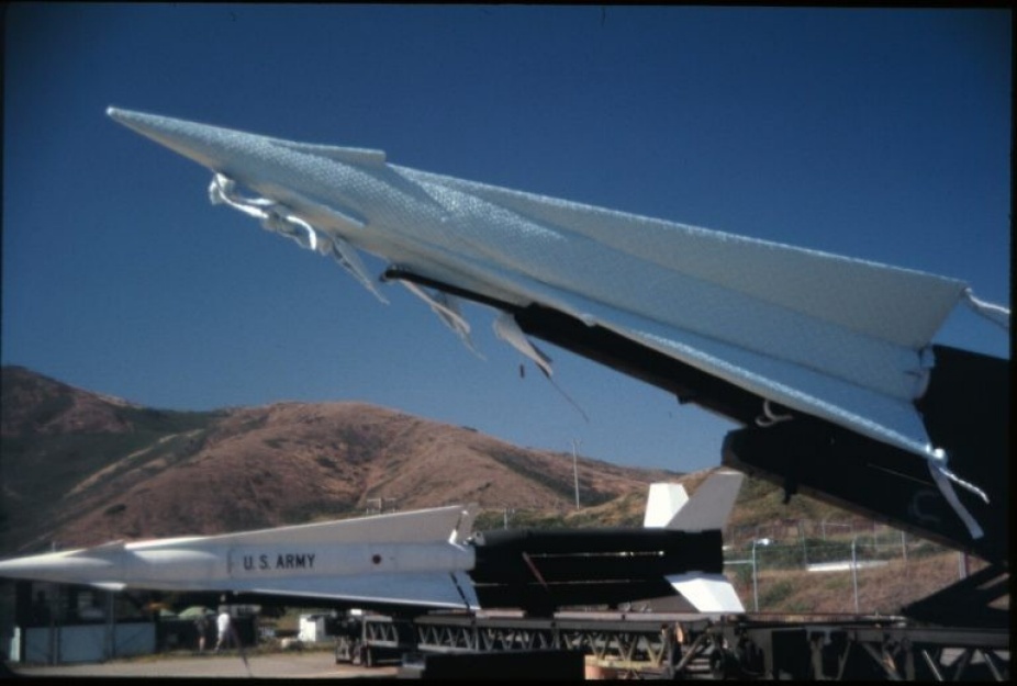 Installation by Elizabeth Demaray of Nike Missile made of fabric. 