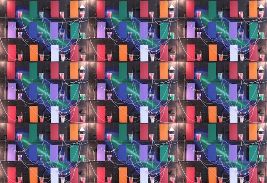 Still Image from Video by Ezra Wube with vertical triangles in red, orange, green, blue, violet and white connected with thin white lines in abstract form. 