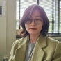 Headshot of HySun (Suri) Kim. 