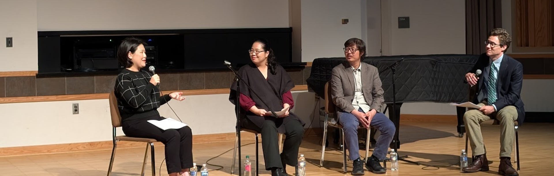left to right (sitting): Bokyung Byun, guitarist and faculty, Univeristy of North Texas; Cecilia Kang clarinetist and associate professor, Indiana University&rsquo;s Jacobs School of Music; Sungmin Shin, guitarist and associate professor of practice at UB; Derek R. Strykowski, associate teaching professor at UB, seated on stage of Kleinhans Music Hall for a panel discussion. 