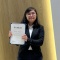 Jenny Nyugen displays her certificate of participation at conclusion of the 2023 Korea America Student Conference. 