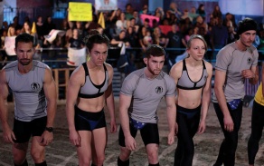 The Mathletes. From left, Captain Kyle "Wooch" Graff and UB students Ellen Lutnick, Trevor Bernard, Zoe Herrick and Chris Komin. Below: Getting a leg up during the competition. 