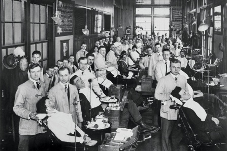 Early 1900s UB dental school students administering care to patients. 
