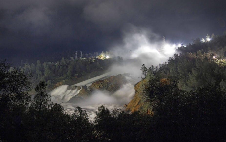 Night-time view of the massive breach of the Oroville Dam, February 2017. Image courtesy of the California Department of Water Resources. 