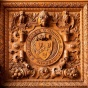 The UB seal and fireplace in the Health Sciences Library in Abbott Hall on South Campus in December 2020. Photographer: Douglas Levere. 