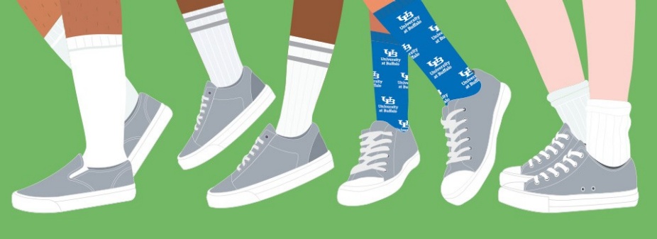 Four pairs of legs and one showing their UB pride with socks. 