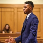 law student in a courtroom. 