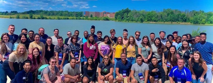Residence life staff in front of Lake LaSalle. 