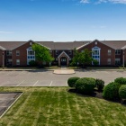 Students entering and exiting UB's South Lake Village Community Building. 