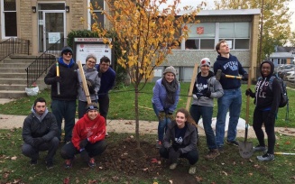 NRHH members planting trees during an event. 
