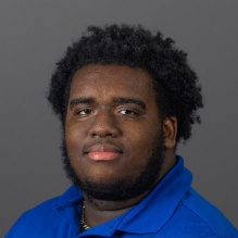 Headshot of Evan Ballantyne. 