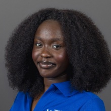 Headshot of Achan Amal. 