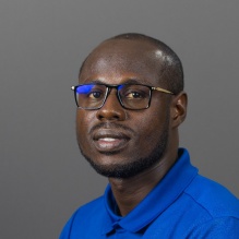 Headshot of Isaac Ahialey.