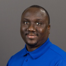 Headshot of Eugene Addoquaye.