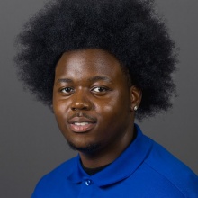 Headshot of Ta'Ron Thomas. 