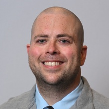 Headshot of Derek Wills. 