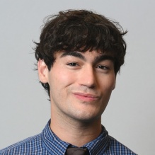 Headshot of Alex Novak. 