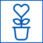 potted plant growing in the shape of a heart. 