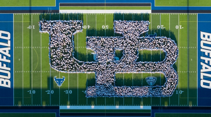 Aerial image of the Interlocking UB made from students at the new student welcome at the UB Stadium. 