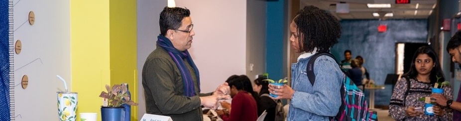 The Career Design Center hosts a pop-up event in April 2023 to help first-generation students practice networking skills and make connections with UB faculty and staff that are also first-generation alums. Photographer: Meredith Forrest Kulwicki. 