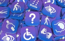 AI generated image of tiles with accessibility iconography displayed on them. 