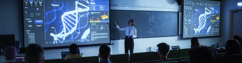 Instructor using technology for a lecture in a classroom. 