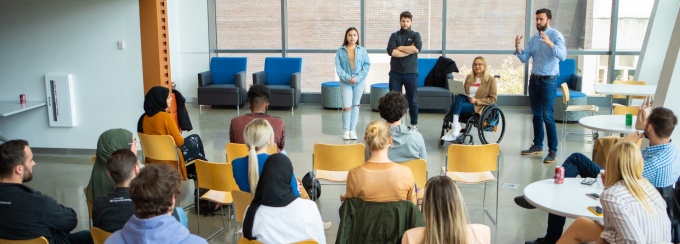 Students participating in a presentation. 
