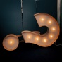 Image of question mark with lights. 