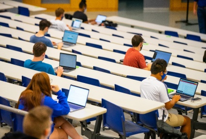 Image of students sitting in a classroom. 