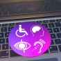 A keyboard with icons for disability overlayed on-top. 